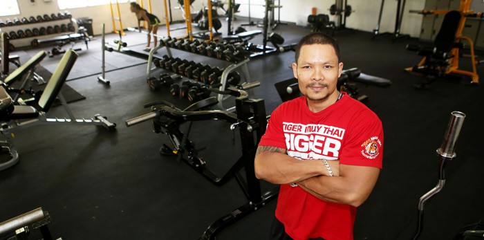 Peter in the indoor fully equipped and air-conditioned weight training facility.